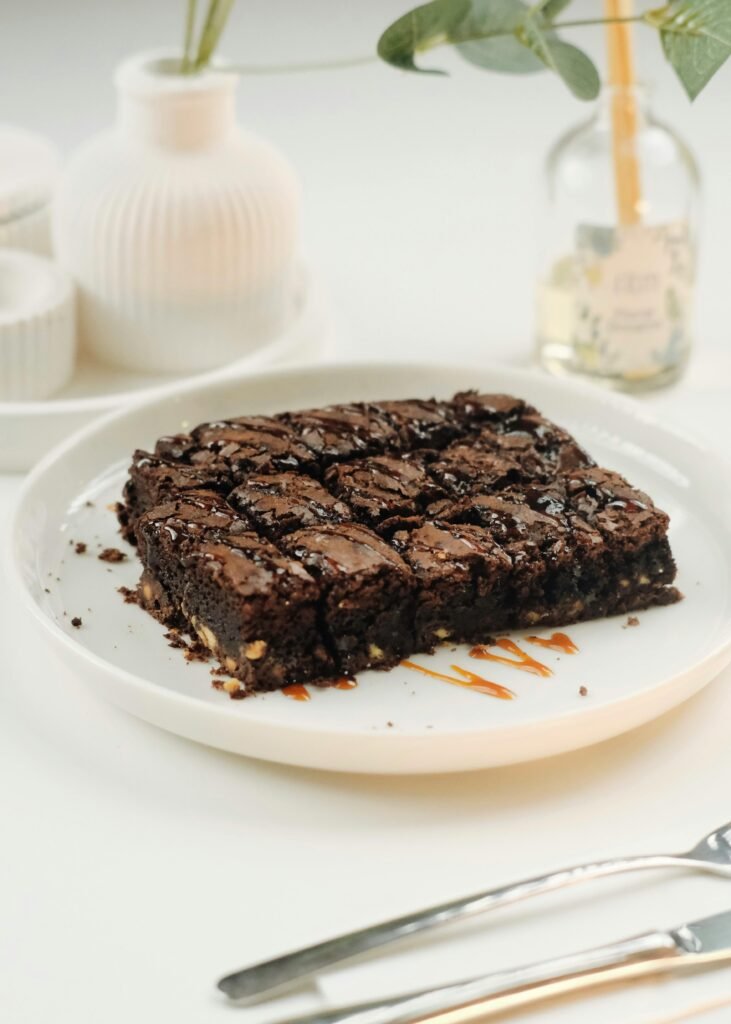 pexels-photo-25595974-25595974 A delectable chocolate brownie dessert on a stylish white plate, ideal for gourmet presentations. gluten-free brownies recipe