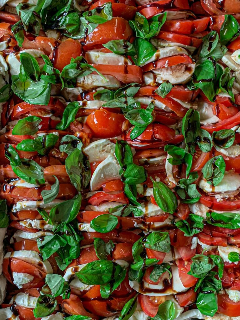pexels-photo-2787672-2787672 Mouthwatering Caprese salad with ripe tomatoes, basil, mozzarella, and balsamic glaze. caprese salad skewers recipe