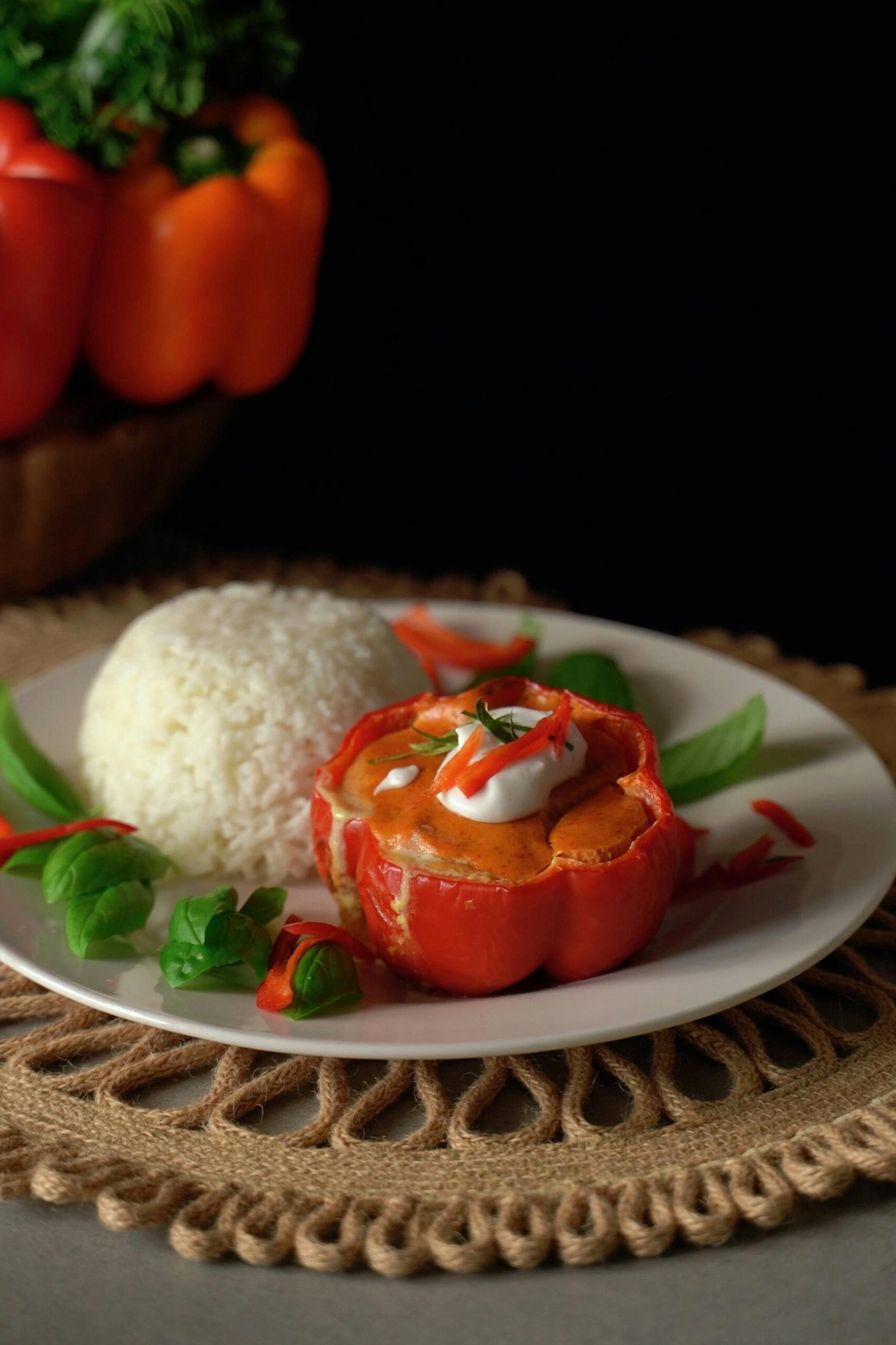 Gourmet stuffed pepper with rice, perfect for a cozy dinner setting.